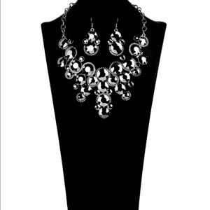 The irreparable statement necklace an earrings